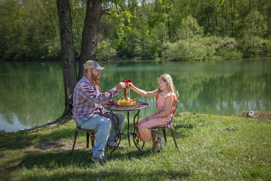 Daddy and daughter having a tea party. Ground To Sky Imagery LLC